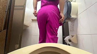 Camera captures nurse peeing in public toilet lycra