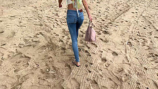 Public Wetting Jeans in Park Near the Beach