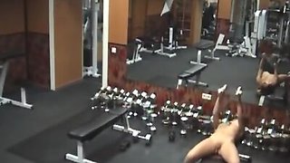 Stripping gal caught by security cam in the gym!