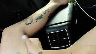 Girl gives handjob in the car with the help of her feet