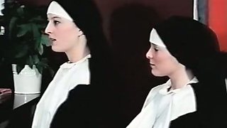 Two young and naughty nuns having orgy with two guys