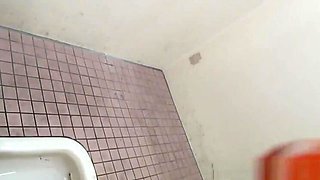 Asian pee in squat toilet