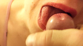 Close-up of her mouth filled with