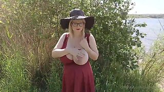 Heavily Pregnant blonde mature outdoors in the woods - Big Natural Boobies