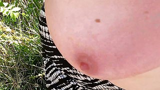 Boobs clapping on the meadow