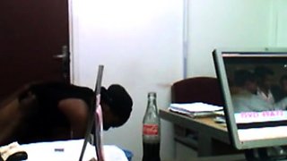 African Uni Student working on gets her grades