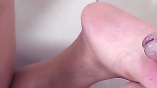 Beautiful Brunette at the Gloryhole Giving a Blowjob, Footjob, and Fuck!