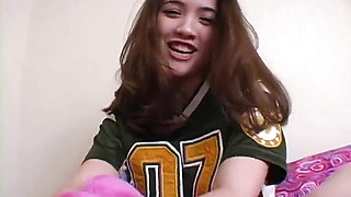Busty teen strips off her American jersey