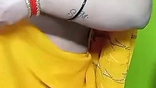 Indian Beautiful Bhabhi in Yellow Color Sari.