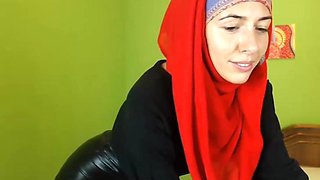Muslimgirl in lovely leather skirt