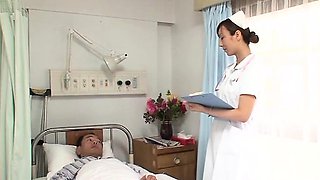 Oriental nurse deals extra big penis betwixt the lips
