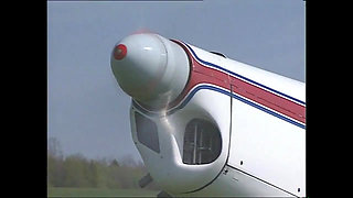 An Aviator Hungry for Pussy Bangs a Hot Redhead on the Grass