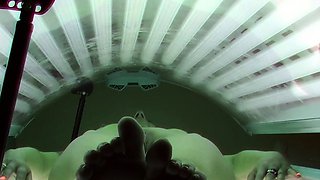 Silicone MILF in solarium