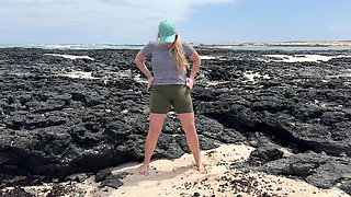 Girl Peeing in Yoga Pants on Beach