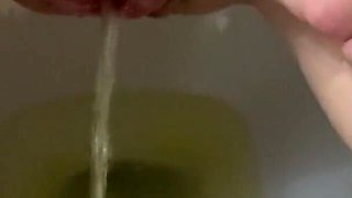 She pees in the toilet beautiful beautiful golden shower on toilet