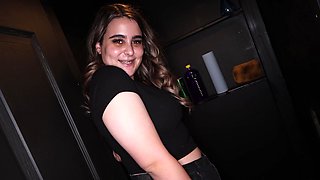Serenity Taylor shakes big natural tits while getting handjobs through a glory hole.