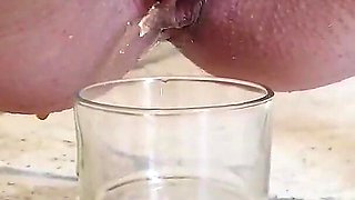 Tattooed Pregnant Brunette Pisses in Glas and the Guy Swallows It