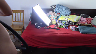 Amateur wife cleans the house with the vacuum cleaner. Sexy has fun with roses naked.