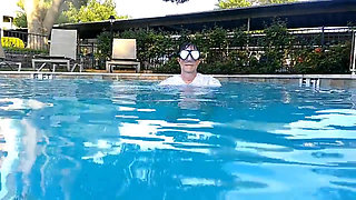 Couple Underwater Diving and Swimming
