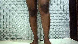 Cute desi girl slowly undressing in bathroom