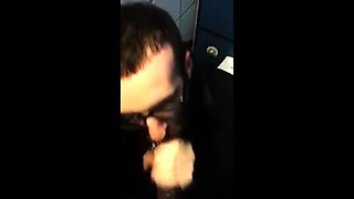 Bearded Guy Sucks Interracial Cock in a Public Restroom