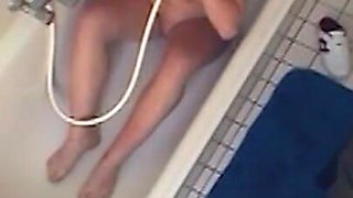 Sexy chubby amateur fucks herself in the bathroom