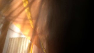 Busty curly brunette with big boobs fucks on couch