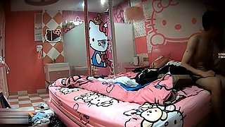 Cute amateur asian web cam girl playing with her toy