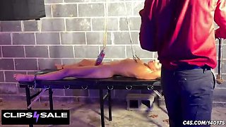 Skinny Blonde BDSM Slave Tied Up With Nipple Clamps And Oiled
