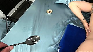 Tattooed hottie eating cum off of spoon after hardcore anal