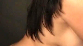 Raylene sucks huge cock from gloryhole while masturbating