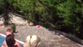 Lovely babes getting fucked in orgy by the swimming pool