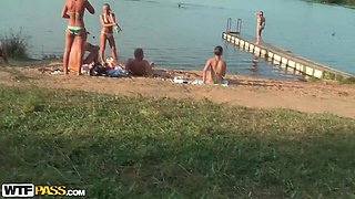 Jennifer in outdoor sex video with a couple fucking on a beach