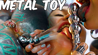 Oily Lesbian Metal Toy Threesome Girls Slippery Fuck