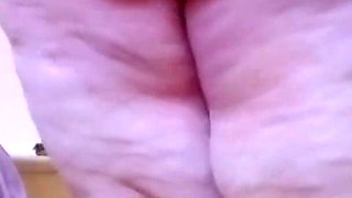 Naked SSBBW cleans lower camera view