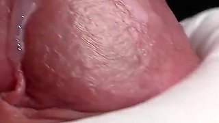 Glans Game with White Latex Gloves in Super-closeup