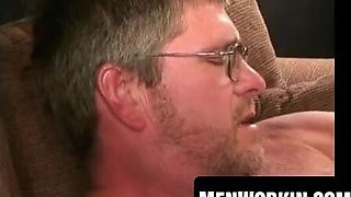 Big aged boy with glasses massages himself and spunks