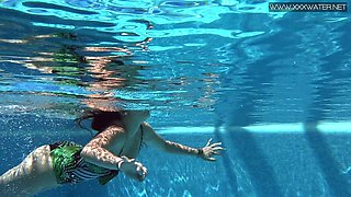 Spanish swimming girl Diana Rius shows striptease under the water