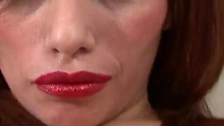 Sexy redhead fucks her ass and pussy with two huge carrots