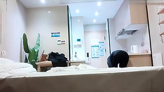 Cute amateur asian web cam girl playing with her toy