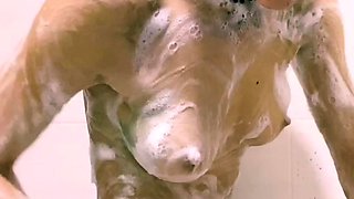 Small titted babe toys her pussy on webcam