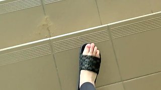 Feet in Flip-flops and Walking in Flip-flops