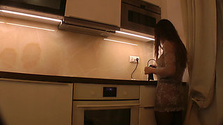 Hot Petite Brunette MILF Babysitter Gets Fully Naked in the Kitchen and Wears Sheer Shirt Pantyhose