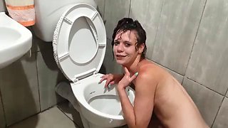 SLUT MILF in the bathroom face down peeing on herself.mp4