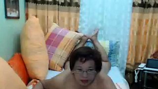 Filipina Granny with Glasses Shows Her Tits on Webcam