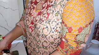 Desi Bhabhi fucked while cutting vegetables in the kitchen