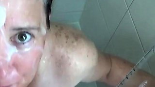 Showering MILF Gets a Big Creamy Facial Surprise