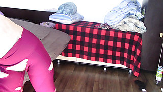 Amateur wife has fun trying on clothes that she cuts.