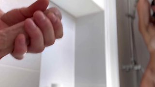 Caught jacking off to her in a bathroom, the wife opens her juicy pussy
