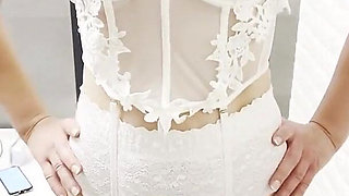 Hotwife Poses in a Bride Costume